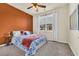 Bedroom featuring a ceiling fan, carpet, and cozy decor at 1016 Laurens Mill Dr., Myrtle Beach, SC 29579