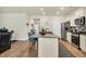 Kitchen island with granite countertop, seating, and stainless steel appliances at 1016 Laurens Mill Dr., Myrtle Beach, SC 29579