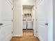 Convenient laundry room with modern washer and dryer, accessible from hallway at 1016 Laurens Mill Dr., Myrtle Beach, SC 29579