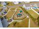 Aerial view of the community playground with slides and other play equipment at 1016 Laurens Mill Dr., Myrtle Beach, SC 29579
