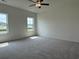 Spacious bedroom with carpet and natural light from two windows at 1025 Jase Dr., Longs, SC 29568