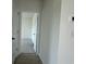 Hallway view leading to a carpeted room at 1025 Jase Dr., Longs, SC 29568