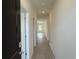 Bright hallway with neutral walls and hardwood flooring at 1025 Jase Dr., Longs, SC 29568