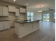 Modern kitchen with island and granite countertops at 1025 Jase Dr., Longs, SC 29568