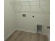 Practical laundry room with connections and shelving at 1025 Jase Dr., Longs, SC 29568