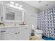 Neutral bathroom with geometric shower curtain, sink vanity and toilet at 111 Maddux Ln. # B, Myrtle Beach, SC 29588