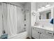 Clean bathroom features a shower-tub combo with white tiling and modern fixtures, creating a fresh and functional space at 111 Maddux Ln. # B, Myrtle Beach, SC 29588