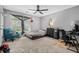 Comfortable bedroom featuring a ceiling fan, desk and a cozy chair near the window at 111 Maddux Ln. # B, Myrtle Beach, SC 29588