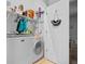 Bright laundry room featuring a washer and dryer with shelving at 111 Maddux Ln. # B, Myrtle Beach, SC 29588
