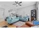 Open living area with comfortable sofas, hardwood floors, decor, and seamless flow to the kitchen and dining spaces at 111 Maddux Ln. # B, Myrtle Beach, SC 29588
