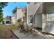 Outdoor patio with dining table, surrounded by well-maintained landscaping, perfect for al fresco dining and entertaining at 111 Maddux Ln. # B, Myrtle Beach, SC 29588