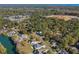 Scenic aerial view of a neighborhood with lake and lush greenery at 160 Shipmaster Ave., Pawleys Island, SC 29585