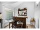 Cozy bar area with dark wood finish and ample seating at 160 Shipmaster Ave., Pawleys Island, SC 29585