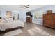 Inviting bedroom with natural light, ceiling fan, and stylish furnishings at 160 Shipmaster Ave., Pawleys Island, SC 29585