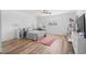 Bright bedroom with ceiling fan and closet and a makeup vanity next to window at 160 Shipmaster Ave., Pawleys Island, SC 29585
