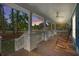 Inviting porch with rocking chairs offering a relaxing outdoor space at 160 Shipmaster Ave., Pawleys Island, SC 29585