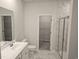 Clean bathroom with marble tile, walk-in shower, and vanity, leading to a walk-in closet at 1848 Seachase Way, North Myrtle Beach, SC 29582