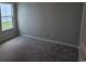 Bedroom with a single window and neutral carpeting at 1848 Seachase Way, North Myrtle Beach, SC 29582