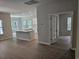 Open concept living area with an island kitchen featuring granite countertops and stainless appliances at 1848 Seachase Way, North Myrtle Beach, SC 29582