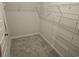 Spacious walk-in closet with carpeted floors and wire shelving at 1848 Seachase Way, North Myrtle Beach, SC 29582