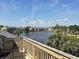 Scenic lake view from a private balcony overlooking lush landscaping and the community at 200 Double Eagle Dr. # D3, Surfside Beach, SC 29575