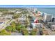 Aerial view of condo building in a beach town with the ocean in the background during a sunny day at 2010 S Ocean Blvd., Myrtle Beach, SC 29577