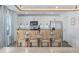 Modern kitchen with stainless steel appliances, granite countertops, and a breakfast bar at 206 Math Place, Longs, SC 29568