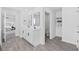 Bright main bathroom with double vanity, neutral walls and access to the bedroom at 206 Math Place, Longs, SC 29568