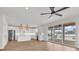Bright and airy kitchen with a center island, modern stainless steel appliances, and sliding doors to a deck at 318 Vista Dr., Murrells Inlet, SC 29576