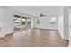 An airy living space featuring vinyl floors, recessed lighting, and sliding doors to an outdoor deck or patio area at 318 Vista Dr., Murrells Inlet, SC 29576