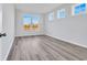 Bedroom with hardwood floors, light walls, and natural light at 415 Joseph St, Longs, SC 29568