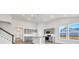 Modern kitchen with gray cabinets, granite countertops, stainless appliances, and bright windows at 415 Joseph St, Longs, SC 29568
