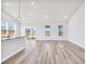 Open living room with hardwood floors and lots of natural light at 415 Joseph St, Longs, SC 29568