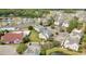 Aerial view showcases the community with cozy homes near a pond and amenities, perfect for relaxed living at 4603 Arran Ct. # C, Myrtle Beach, SC 29579