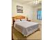 Bedroom featuring a bed with blue striped bedding and a large window with blinds at 4603 Arran Ct. # C, Myrtle Beach, SC 29579