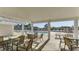 Patio with seating area overlooking the pool provides a perfect spot for outdoor dining and relaxation at 4603 Arran Ct. # C, Myrtle Beach, SC 29579