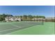 Outdoor tennis court surrounded by greenery, offering a great space for recreational activities and fitness at 4603 Arran Ct. # C, Myrtle Beach, SC 29579