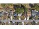 An aerial view highlighting the home in a suburban neighborhood setting. Beautiful, well-manicured yards and mature trees at 6454 Sweet Gum Trail, Myrtle Beach, SC 29588