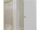 Bathroom featuring a shower with glass doors and a door leading to a hall at 6454 Sweet Gum Trail, Myrtle Beach, SC 29588