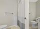 Bathroom featuring a toilet, shower with shower curtain, and a towel bar at 6454 Sweet Gum Trail, Myrtle Beach, SC 29588