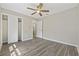 Bedroom featuring a ceiling fan, closet with sliding doors, and ensuite bathroom at 6454 Sweet Gum Trail, Myrtle Beach, SC 29588