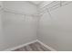 Walk-in closet with wire shelving and wood-look flooring at 6454 Sweet Gum Trail, Myrtle Beach, SC 29588