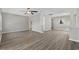 Open-concept living room with luxury vinyl plank flooring and freshly painted walls at 6454 Sweet Gum Trail, Myrtle Beach, SC 29588