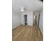 Bedroom with ceiling fan and new wood-look vinyl flooring at 703 S 1St Ave. S # 34D, North Myrtle Beach, SC 29582