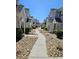Charming townhomes featuring sidewalks and attractive landscaping for a welcoming curb appeal at 703 S 1St Ave. S # 34D, North Myrtle Beach, SC 29582
