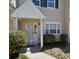 Inviting front entrance featuring well-maintained landscaping, a white door and trim for a clean, welcoming curb appeal at 703 S 1St Ave. S # 34D, North Myrtle Beach, SC 29582