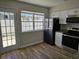 Bright kitchen with modern appliances, including a stainless steel refrigerator and range, accented by natural light at 703 S 1St Ave. S # 34D, North Myrtle Beach, SC 29582