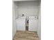 Convenient laundry room equipped with a washer and dryer near shelving at 703 S 1St Ave. S # 34D, North Myrtle Beach, SC 29582