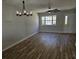 Spacious living area boasts wood floors, modern lighting, and an open layout for easy entertaining at 703 S 1St Ave. S # 34D, North Myrtle Beach, SC 29582