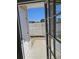 Private outdoor patio with a white fence, perfect for relaxing and enjoying the weather at 703 S 1St Ave. S # 34D, North Myrtle Beach, SC 29582